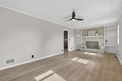 Welcome home to this beautifully renovated 1975 gem that - photo 4