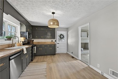 Welcome home to this beautifully renovated 1975 gem that - photo 5