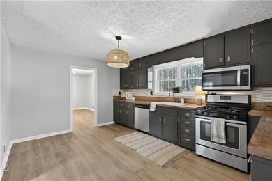Welcome home to this beautifully renovated 1975 gem that - photo 6