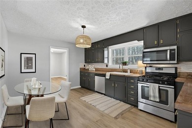Welcome home to this beautifully renovated 1975 gem that - photo 7