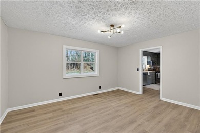 Welcome home to this beautifully renovated 1975 gem that - photo 9