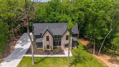 PICTURE PERFECT HOME... Nestled in a tree shaded 1 acre lot in - photo 3