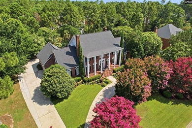 This stately all-brick home draws you in with its circle - photo 3