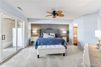 Experience Lake of the Ozarks living at its finest in this - photo 15