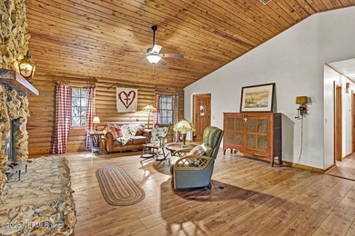 Welcome to this a charming and unique Log Cabin retreat (that - photo 2