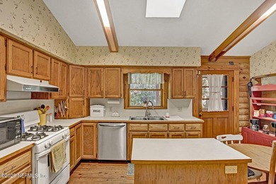 Welcome to this a charming and unique Log Cabin retreat (that - photo 7