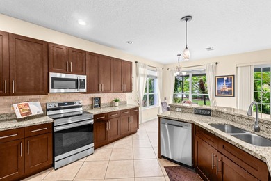 Welcome home to this light, bright, & spacious 5 bedroom + - photo 1