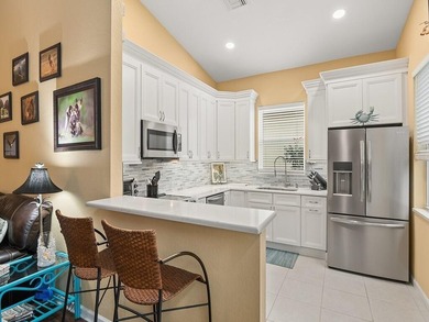 Indoor-outdoor living takes center stage in this well-maintained - photo 5