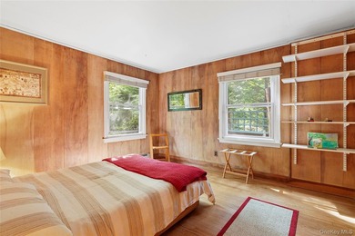 *A Peaceful Retreat Among the Trees.* Designed to embrace its - photo 11