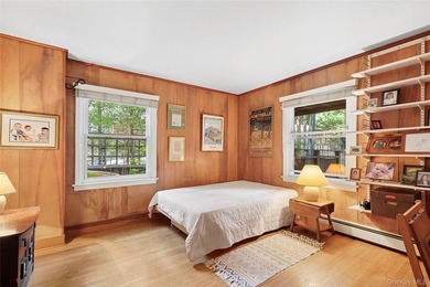 *A Peaceful Retreat Among the Trees.* Designed to embrace its - photo 12