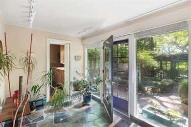 *A Peaceful Retreat Among the Trees.* Designed to embrace its - photo 15