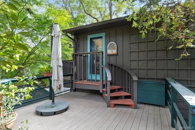 *A Peaceful Retreat Among the Trees.* Designed to embrace its - photo 17