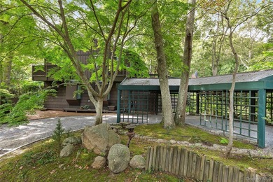 *A Peaceful Retreat Among the Trees.* Designed to embrace its - photo 18