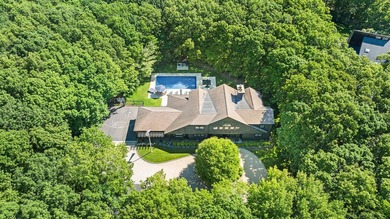 Set at the end of a private driveway on 3.3 acres in - photo 21