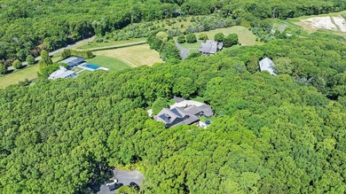 Set at the end of a private driveway on 3.3 acres in - photo 26