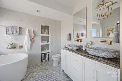 Nestled in the gated community of Dutch Island, this beautifully - photo 41