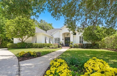 Nestled on a private 1.67-acre estate across from the - photo 1