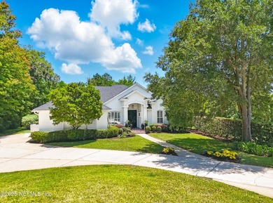 Nestled on a private 1.67-acre estate across from the - photo 5