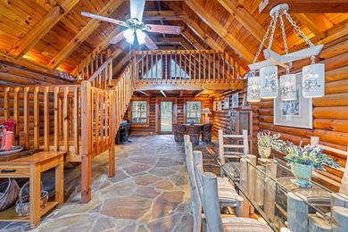 One-owner custom built log home on 2.5 acres on a small lake - photo 11