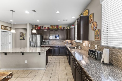 Well-maintained two-story home in Surprise featuring two master