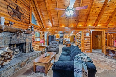 One-owner custom built log home on 2.5 acres on a small lake - photo 12