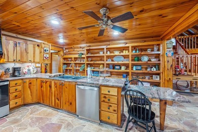 One-owner custom built log home on 2.5 acres on a small lake - photo 14