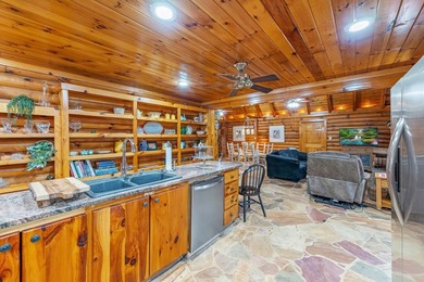 One-owner custom built log home on 2.5 acres on a small lake - photo 15