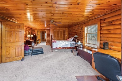 One-owner custom built log home on 2.5 acres on a small lake - photo 16