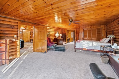 One-owner custom built log home on 2.5 acres on a small lake - photo 17