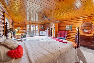 One-owner custom built log home on 2.5 acres on a small lake - photo 18