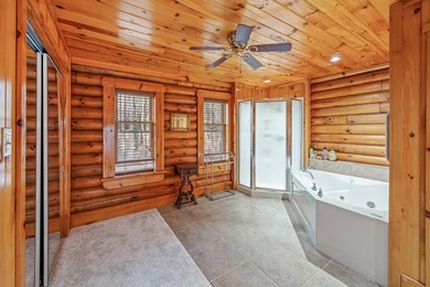 One-owner custom built log home on 2.5 acres on a small lake - photo 20