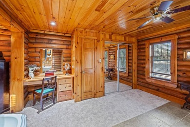 One-owner custom built log home on 2.5 acres on a small lake - photo 21