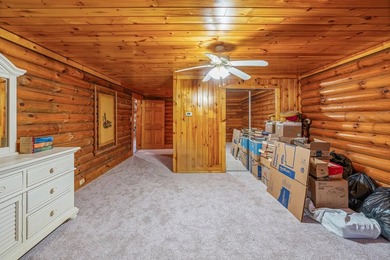 One-owner custom built log home on 2.5 acres on a small lake - photo 23