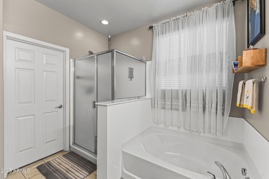 Well-maintained two-story home in Surprise featuring two master