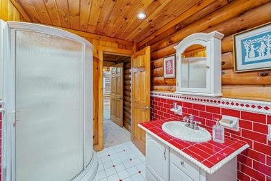 One-owner custom built log home on 2.5 acres on a small lake - photo 25