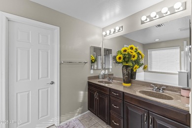 Well-maintained two-story home in Surprise featuring two master