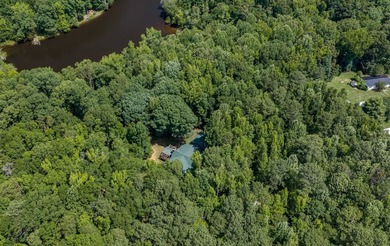 One-owner custom built log home on 2.5 acres on a small lake - photo 36