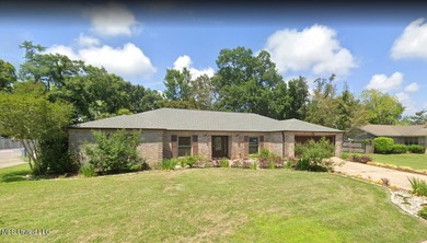 Assumable 2.75% VA mortgage + Bayou View Schools-- great rate - photo 1