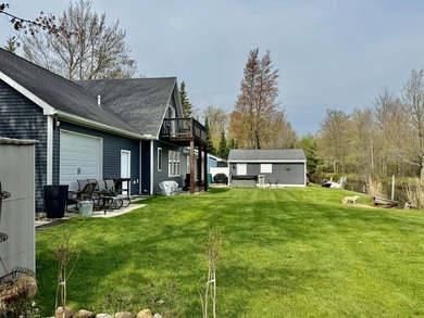 New canal-front listing on Houghton Lake offering 120 ft of - photo 3