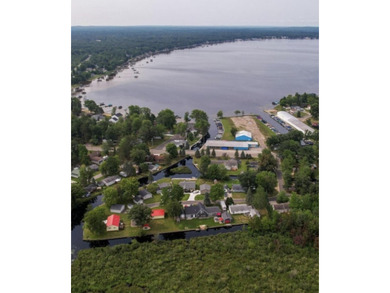 New canal-front listing on Houghton Lake offering 120 ft of - photo 8