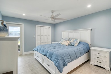 Experience waterfront living in this beautifully updated - photo 18