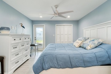Experience waterfront living in this beautifully updated - photo 19