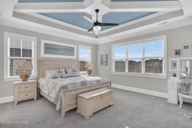 Coastal luxury meets low-maintenance living in this beautifully