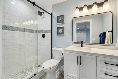 Experience waterfront living in this beautifully updated - photo 21