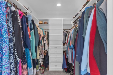 Coastal luxury meets low-maintenance living in this beautifully