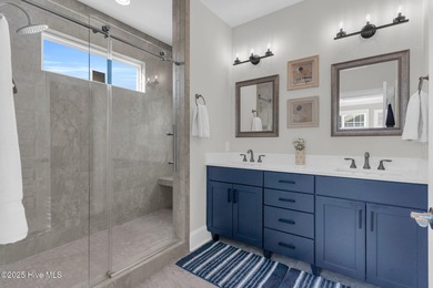 Coastal luxury meets low-maintenance living in this beautifully