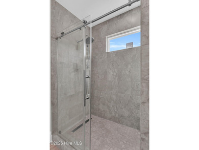 Coastal luxury meets low-maintenance living in this beautifully