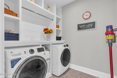 Coastal luxury meets low-maintenance living in this beautifully