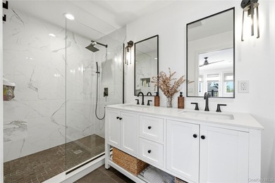 Welcome to this tastefully updated 4-bedroom, 3-bath home in one - photo 28