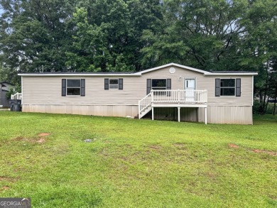 Lake Home For Sale in Locust Grove, Georgia